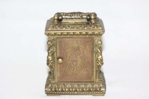 **RS17** A gorgeous ornate brass bevelled glass carriage clock w/ repousse detail & roman numerals