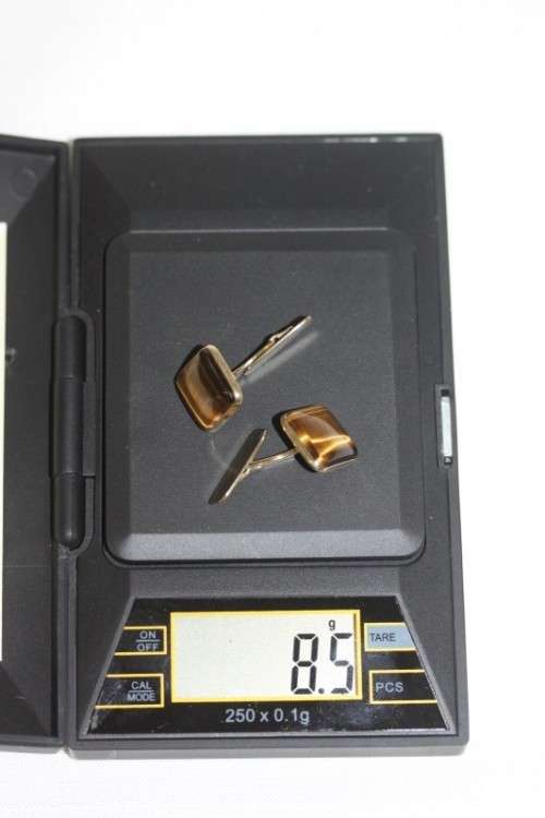 A stunning pair of 9ct yellow gold gents "whale-back" cuff-links w/ beautiful deep tigers eye stones