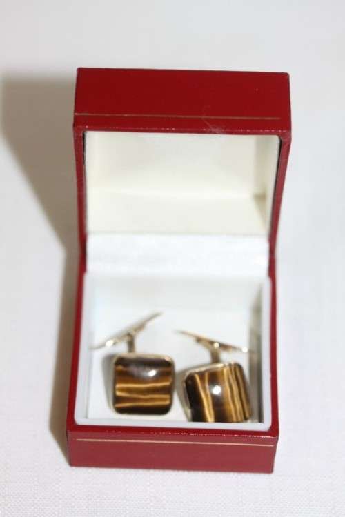 A stunning pair of 9ct yellow gold gents "whale-back" cuff-links w/ beautiful deep tigers eye stones