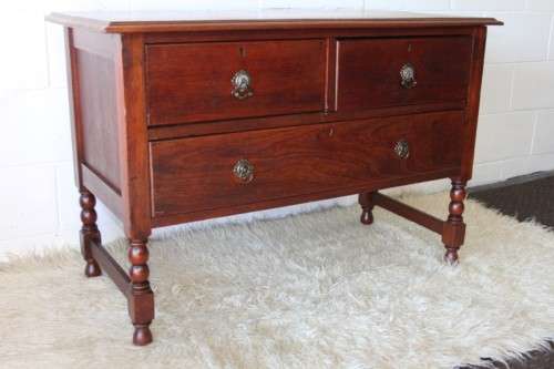 A marvellous solid oak dresser with three good sized drawers and ornate handles