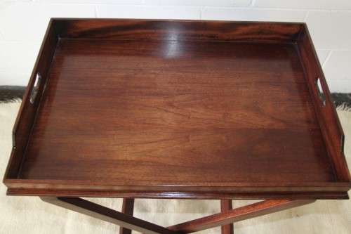 A gorgeous mahogany butlers tray w/ removable tray, perfect on the patio/pool area