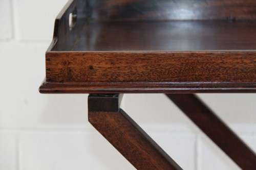 A gorgeous mahogany butlers tray w/ removable tray, perfect on the patio/pool area