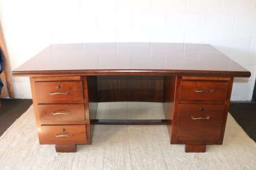 An awesome "curved front" office/ executive desk with ample drawers in great condition