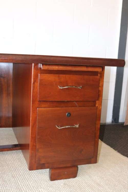 An awesome "curved front" office/ executive desk with ample drawers in great condition