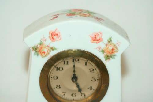 A stunning vintage white porcelain table clock w floral print detailing & brass clock - RS17Sale