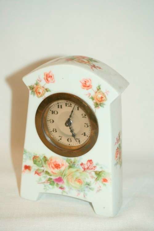 A stunning vintage white porcelain table clock w floral print detailing & brass clock - RS17Sale