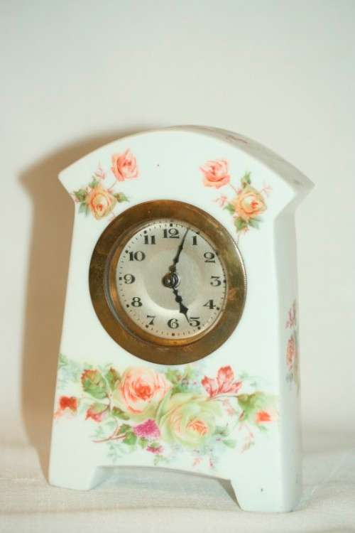 A stunning vintage white porcelain table clock w floral print detailing & brass clock - RS17Sale