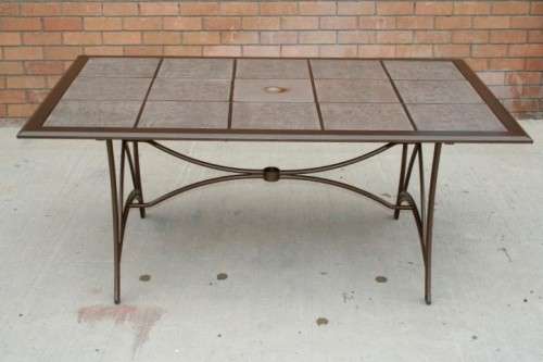 An awesome 6-seater "All-weather" wrought iron tiled top patio suite incl 6x large patio armchairs