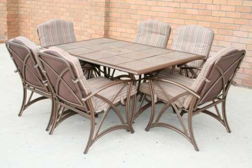 An awesome 6-seater "All-weather" wrought iron tiled top patio suite incl 6x large patio armchairs