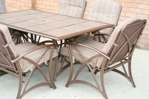 An awesome 6-seater "All-weather" wrought iron tiled top patio suite incl 6x large patio armchairs