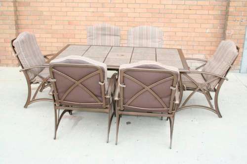 An awesome 6-seater "All-weather" wrought iron tiled top patio suite incl 6x large patio armchairs