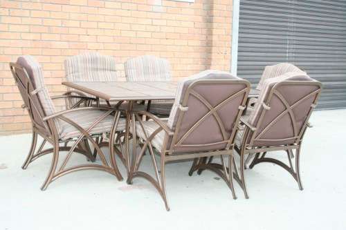 An awesome 6-seater "All-weather" wrought iron tiled top patio suite incl 6x large patio armchairs