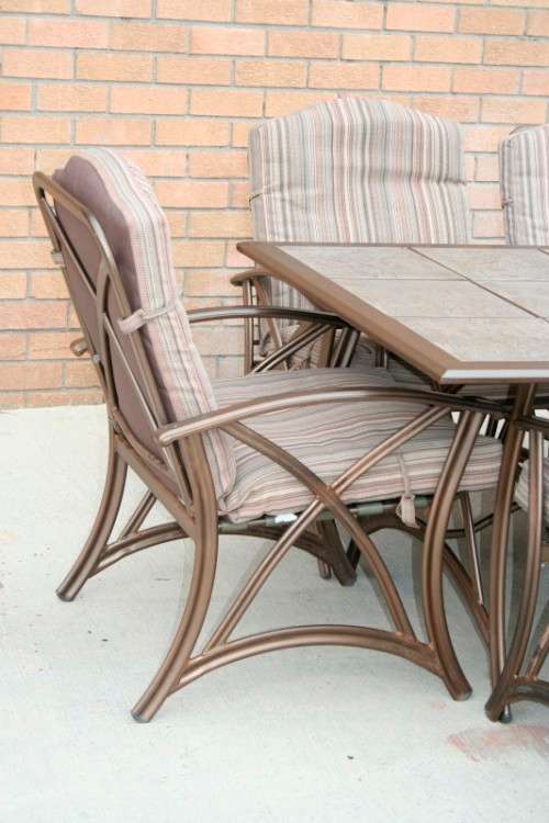 An awesome 6-seater "All-weather" wrought iron tiled top patio suite incl 6x large patio armchairs