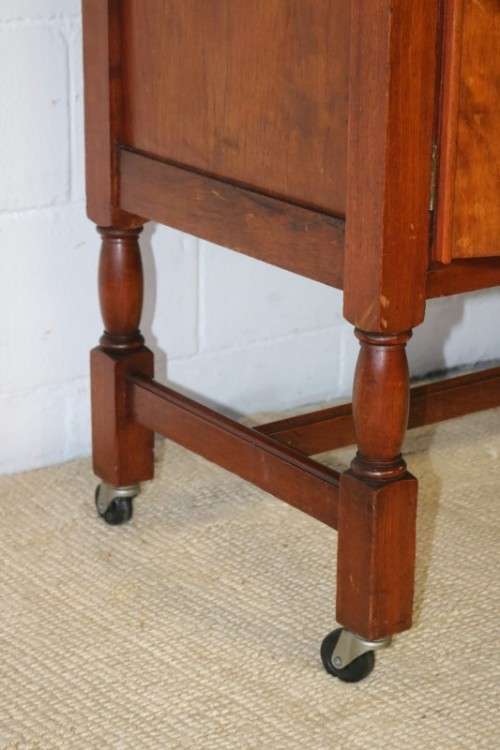 A remarkable Art Deco oak drinks cabinet with fall down counter and spacious cupboards