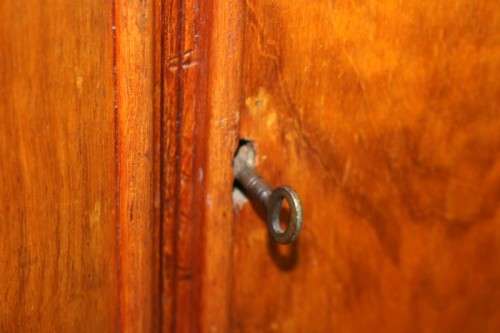 A remarkable Art Deco oak drinks cabinet with fall down counter and spacious cupboards