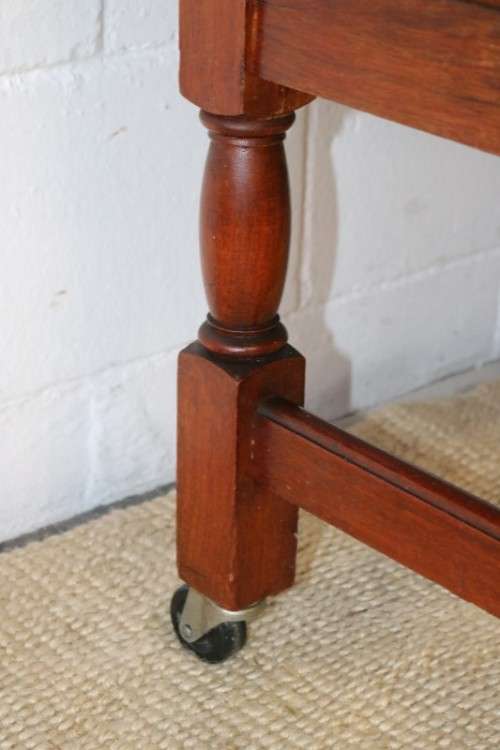 A remarkable Art Deco oak drinks cabinet with fall down counter and spacious cupboards