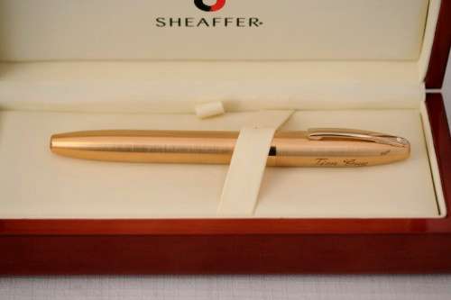 A superb boxed brushed 22ct gold plated engraved Sheaffer Legacy Heritage roller-ball pen