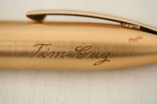 A superb boxed brushed 22ct gold plated engraved Sheaffer Legacy Heritage roller-ball pen