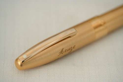 A superb boxed brushed 22ct gold plated engraved Sheaffer Legacy Heritage roller-ball pen