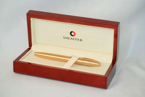 A superb boxed brushed 22ct gold plated engraved Sheaffer Legacy Heritage roller-ball pen