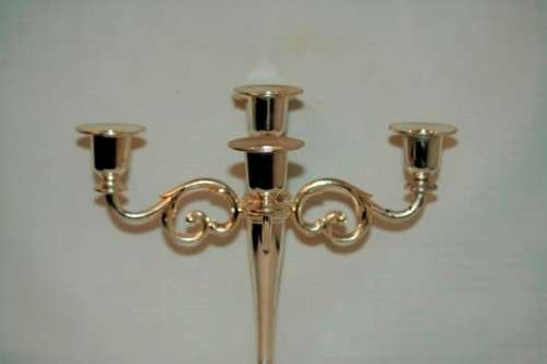 A fabulous tall 5-arm silver plated candelabra with ornate detailing and felt lined base