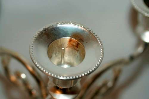 A fabulous tall 5-arm silver plated candelabra with ornate detailing and felt lined base