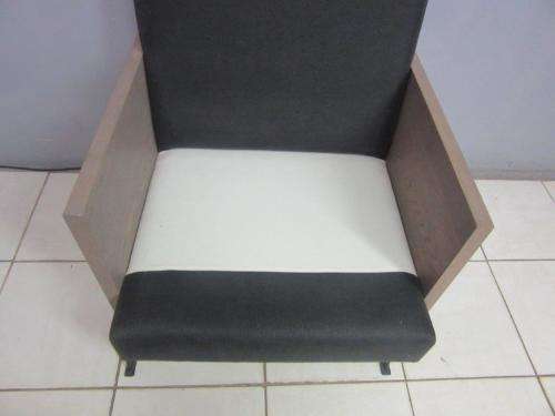 An absolutely gorgeous single seater sofa chair with futon and clean, stylish lines and wooden sides