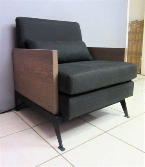 An absolutely gorgeous single seater sofa chair with futon and clean, stylish lines and wooden sides