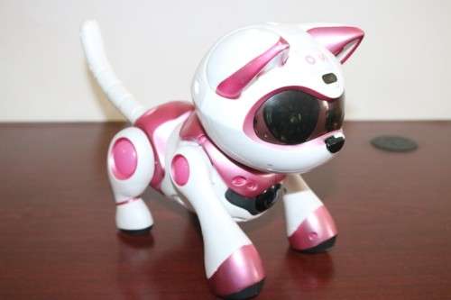 A pink "Tekno Kitty" intelligent robotic toy that interacts with its environment, great gift 4 kids!