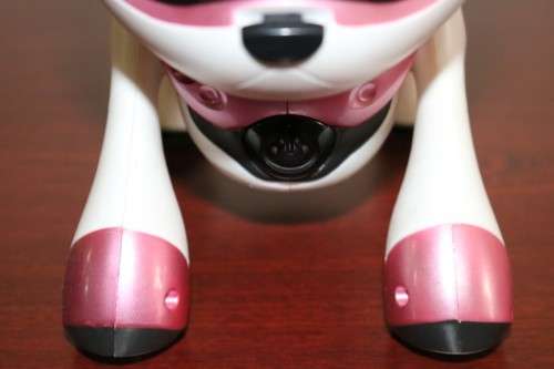 A pink "Tekno Kitty" intelligent robotic toy that interacts with its environment, great gift 4 kids!