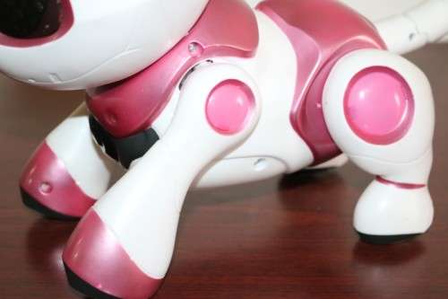 A pink "Tekno Kitty" intelligent robotic toy that interacts with its environment, great gift 4 kids!