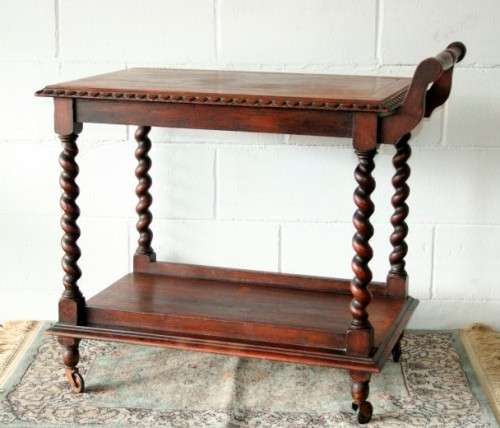 A rare antique Victorian Honeyed-oak barley-twist drinks/ tea trolley on castors in great condition