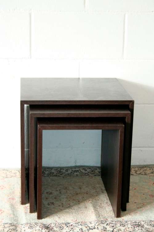 A fabulous set of "modern" styled stacking/ nesting tables, stunning in any living area in the home