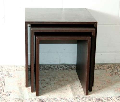 A fabulous set of "modern" styled stacking/ nesting tables, stunning in any living area in the home