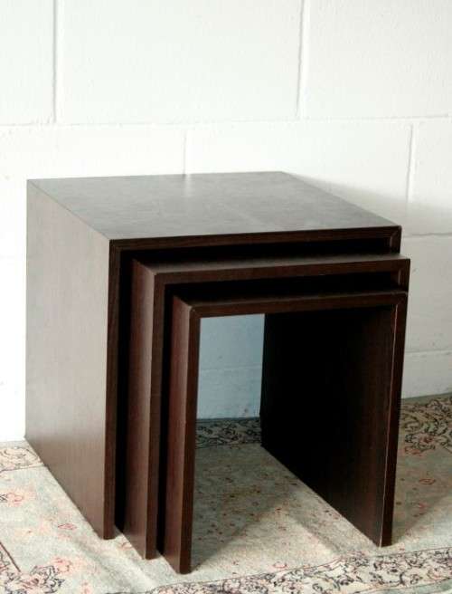 A fabulous set of "modern" styled stacking/ nesting tables, stunning in any living area in the home