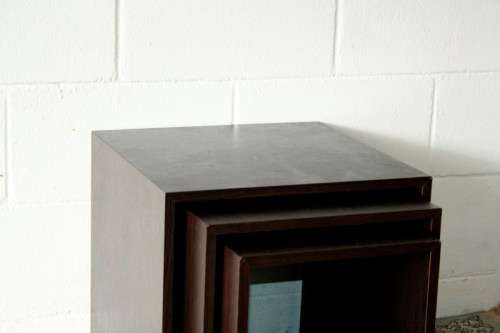 A fabulous set of "modern" styled stacking/ nesting tables, stunning in any living area in the home