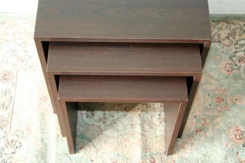 A fabulous set of "modern" styled stacking/ nesting tables, stunning in any living area in the home