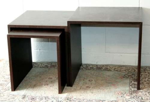 A fabulous set of "modern" styled stacking/ nesting tables, stunning in any living area in the home