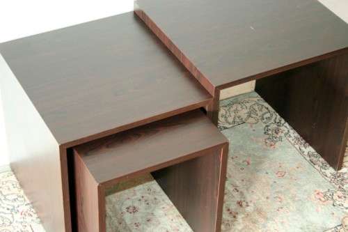A fabulous set of "modern" styled stacking/ nesting tables, stunning in any living area in the home