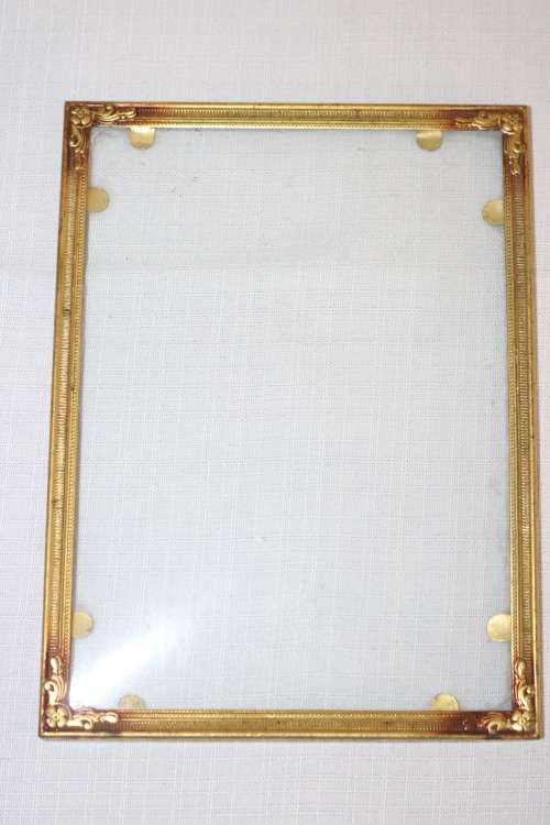 Three beautiful assorted metal free standing photo frames including an antique frame