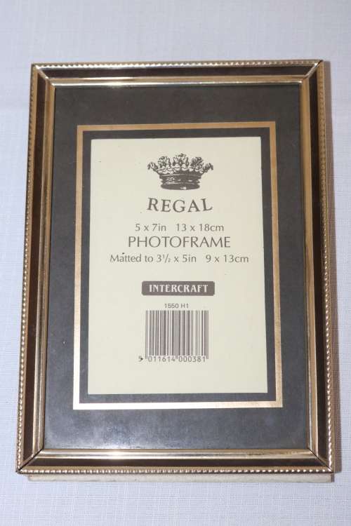 Three beautiful assorted metal free standing photo frames including an antique frame