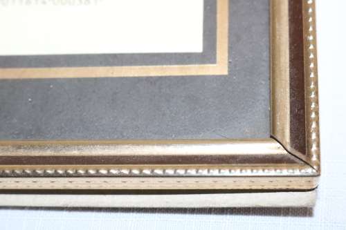 Three beautiful assorted metal free standing photo frames including an antique frame