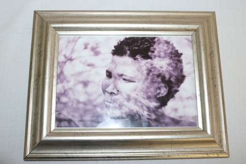 Three beautiful assorted metal free standing photo frames including an antique frame