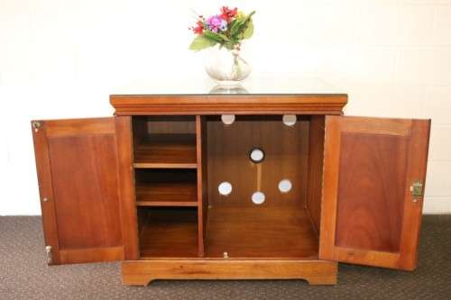 A wonderful Mahogany mini bar cabinet with shelves inside and a removable glass top on castors