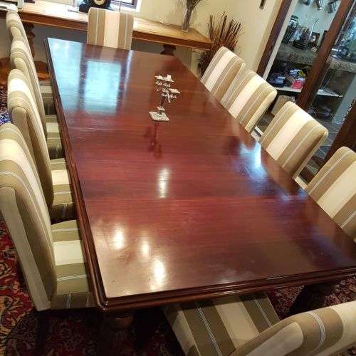 A spectacular Mahogany 8-10 seater dining room suite with luxuriously upholstered chairs - STUNNING!