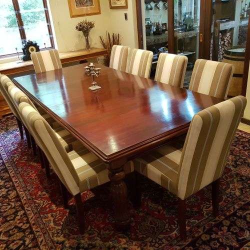 A spectacular Mahogany 8-10 seater dining room suite with luxuriously upholstered chairs - STUNNING!