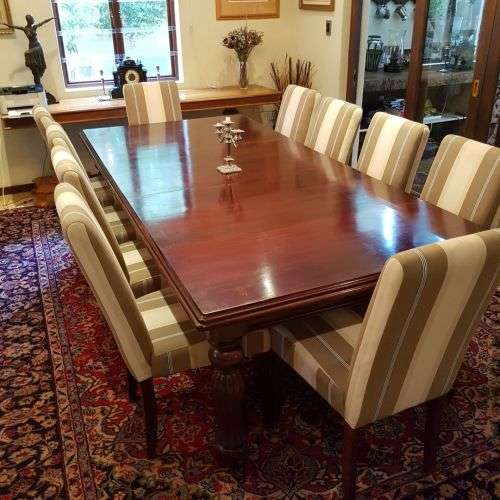 A spectacular Mahogany 8-10 seater dining room suite with luxuriously upholstered chairs - STUNNING!