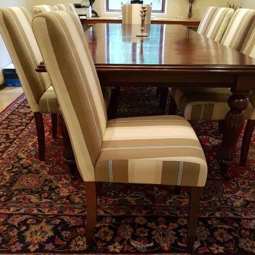 A spectacular Mahogany 8-10 seater dining room suite with luxuriously upholstered chairs - STUNNING!