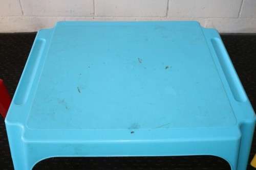 A set of 7x kids multi-coloured plastic chairs & a blue kids table; perfect for kids play room