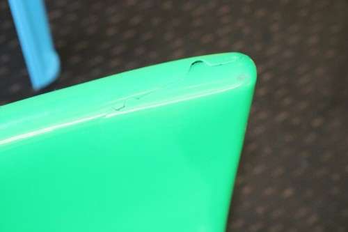 A set of 7x kids multi-coloured plastic chairs & a blue kids table; perfect for kids play room